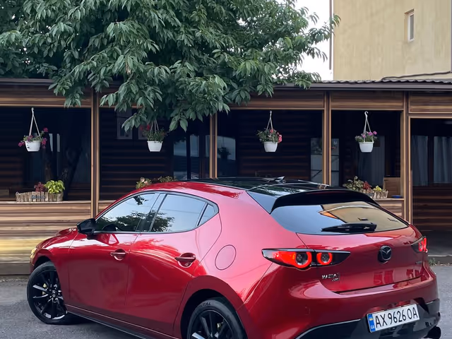 Mazda 3 - фото 4