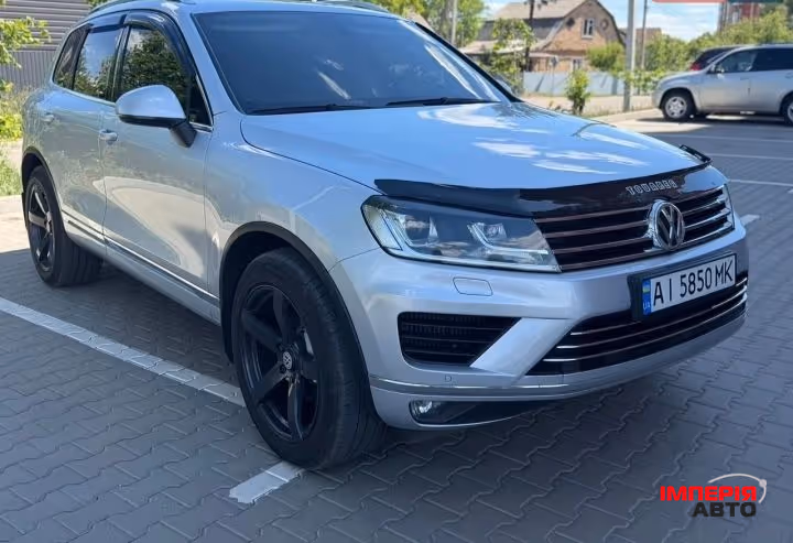 Volkswagen Touareg - фото 1