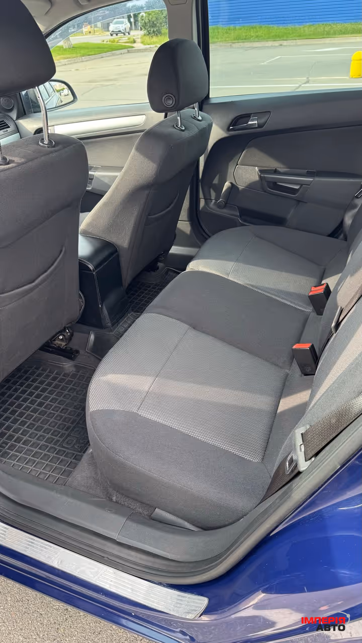 Opel Astra - фото 11