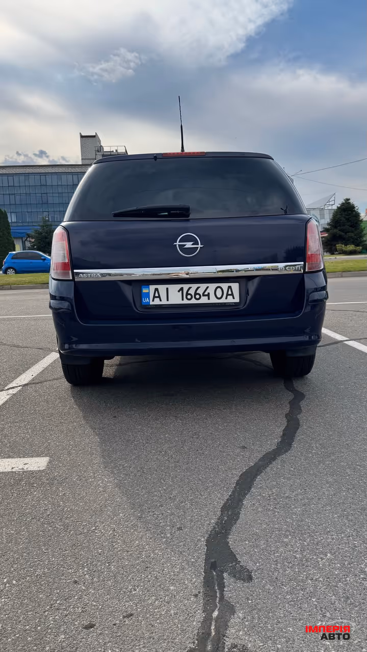 Opel Astra - фото 5