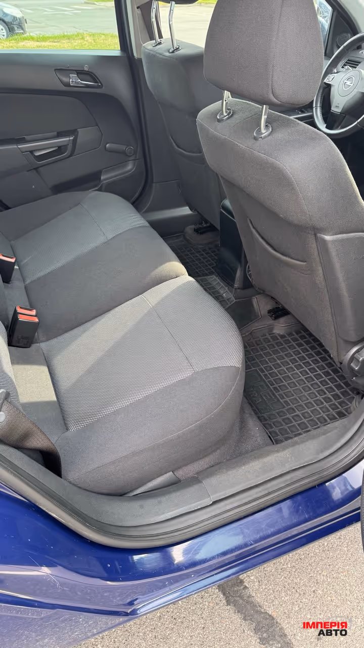 Opel Astra - фото 16