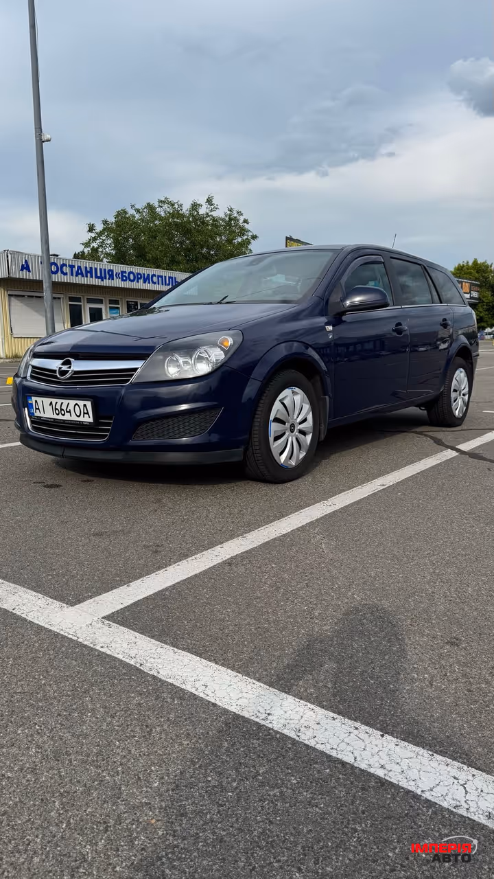 Opel Astra - фото 1