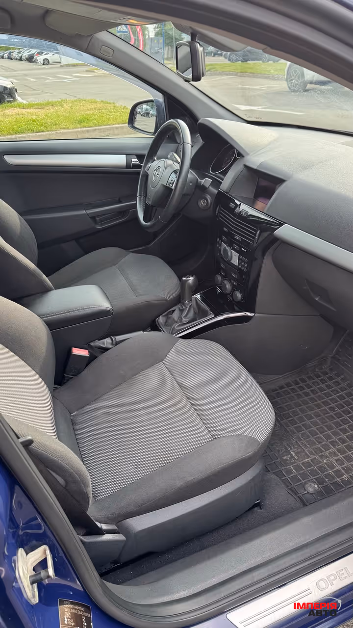 Opel Astra - фото 13