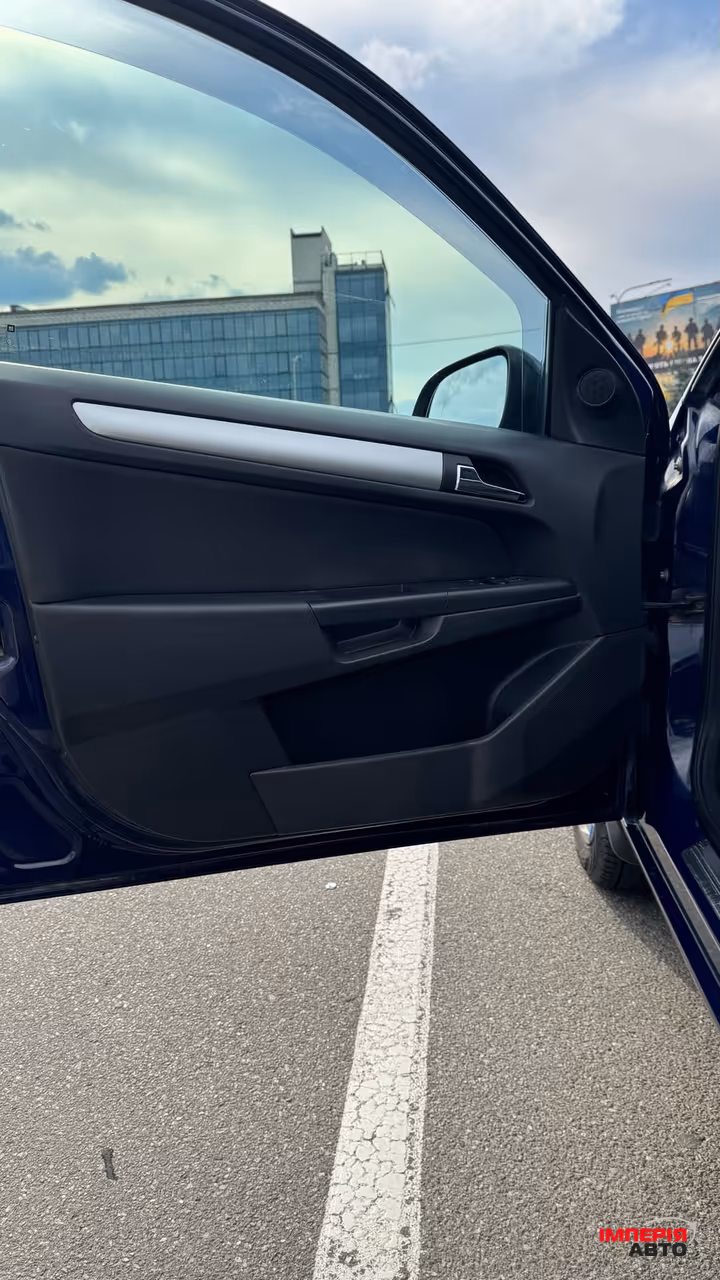 Opel Astra - фото 8