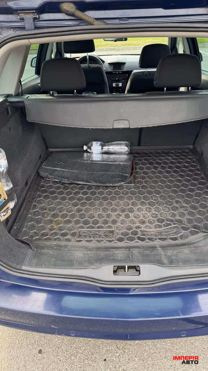 Opel Astra - фото 20