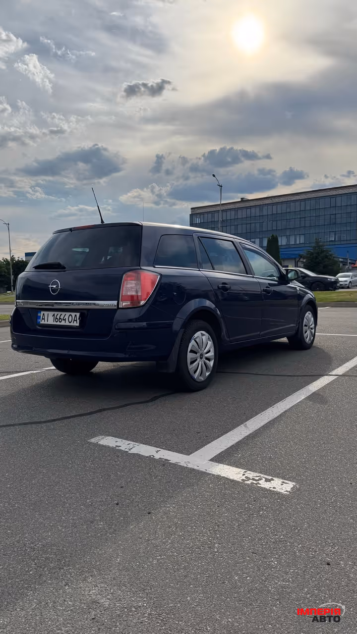 Opel Astra - фото 6