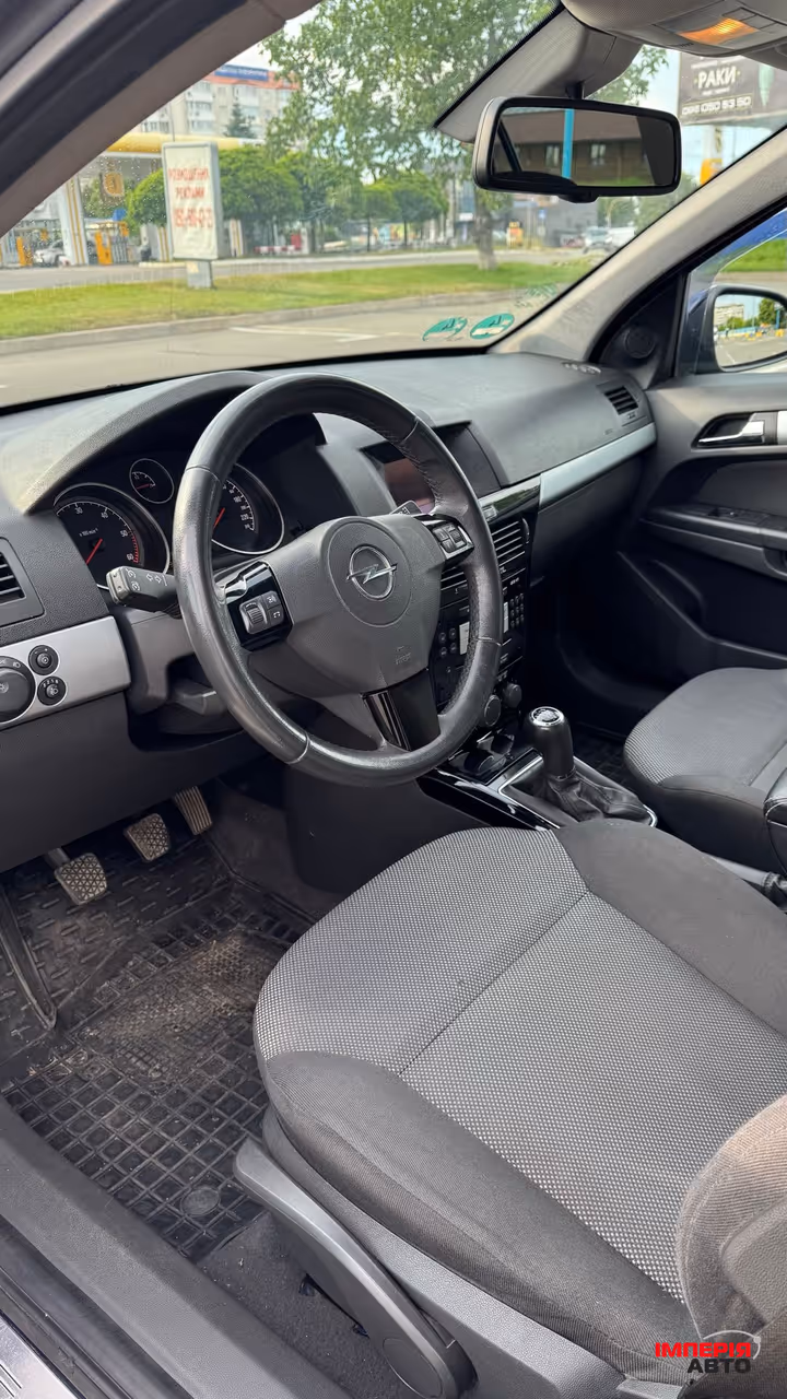 Opel Astra - фото 7
