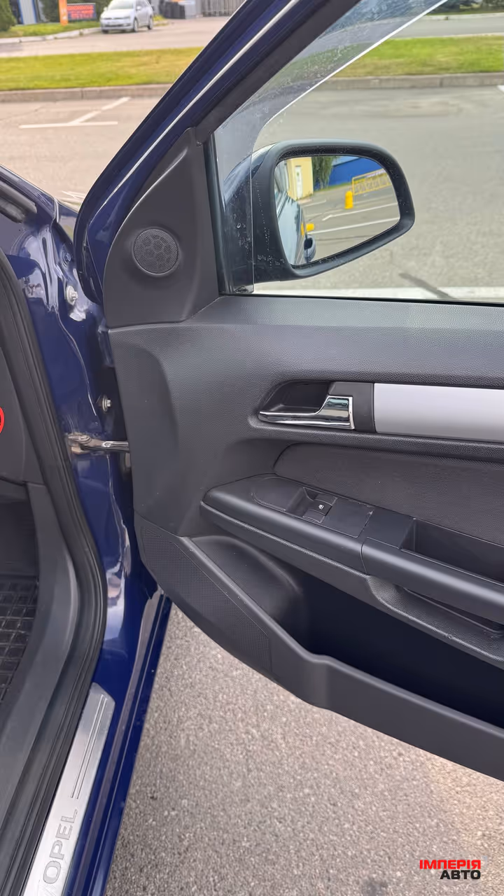 Opel Astra - фото 14