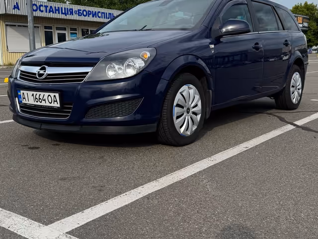 Opel Astra - фото 1