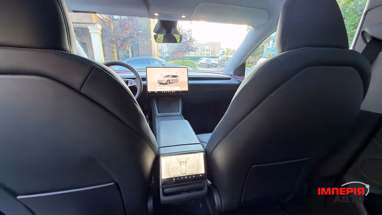 Tesla Model Y - фото 11