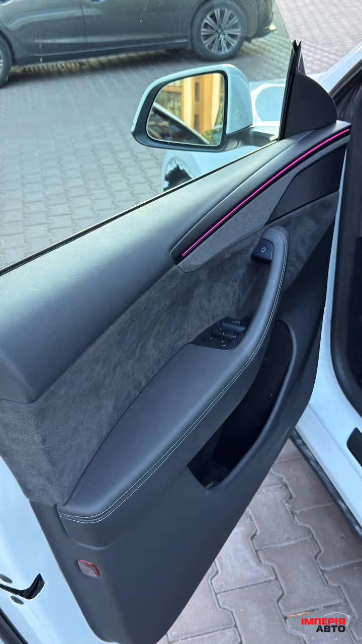 Tesla Model Y - фото 13