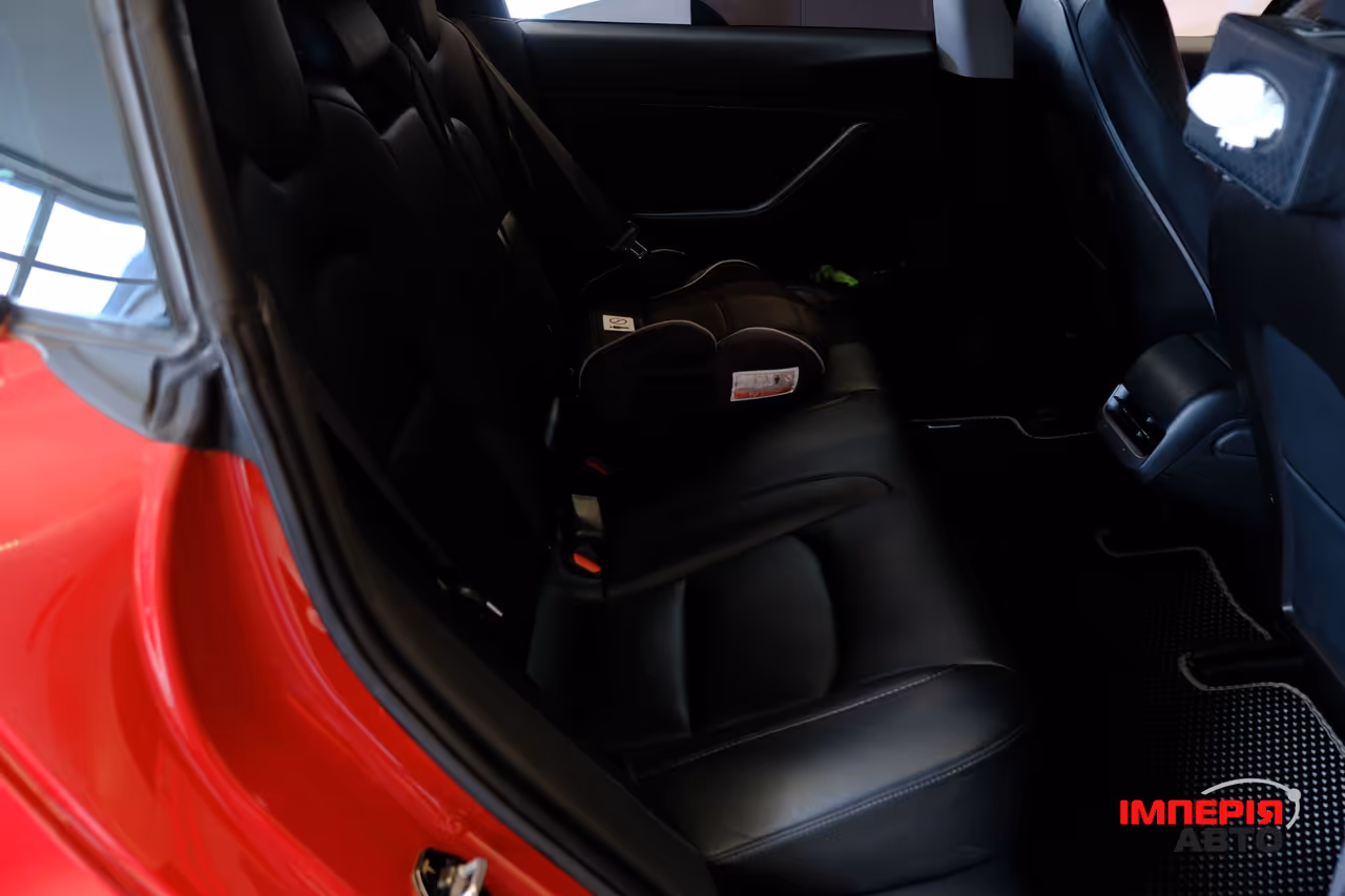Tesla Model 3 - фото 9