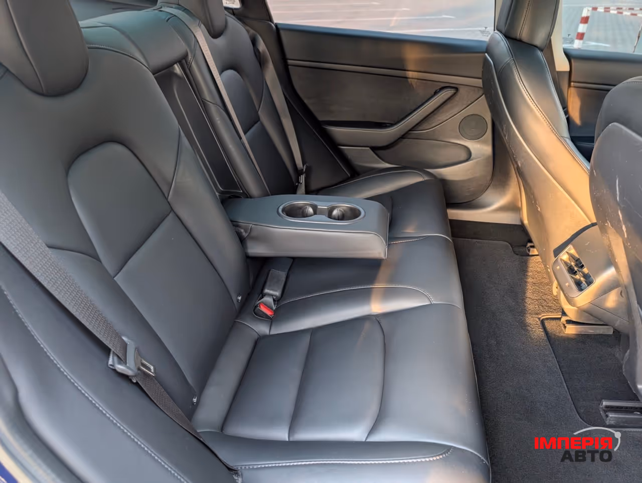 Tesla Model 3 - фото 12