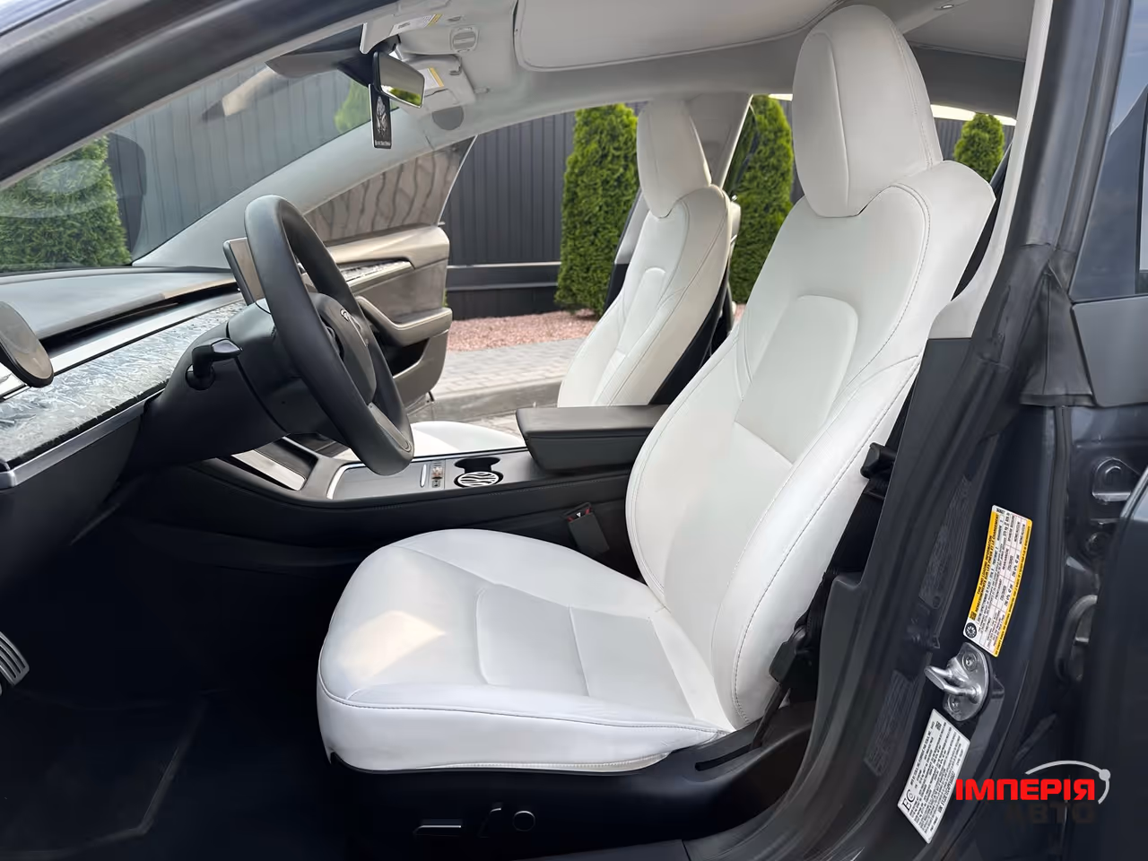 Tesla Model 3 - фото 13