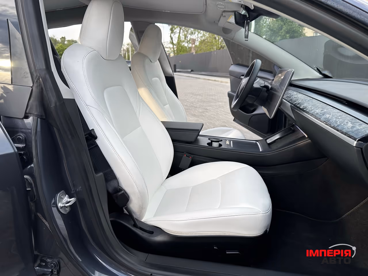 Tesla Model 3 - фото 28