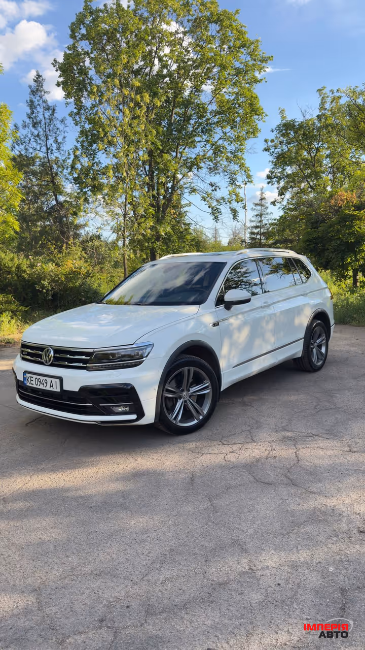 Volkswagen Tiguan - фото 1