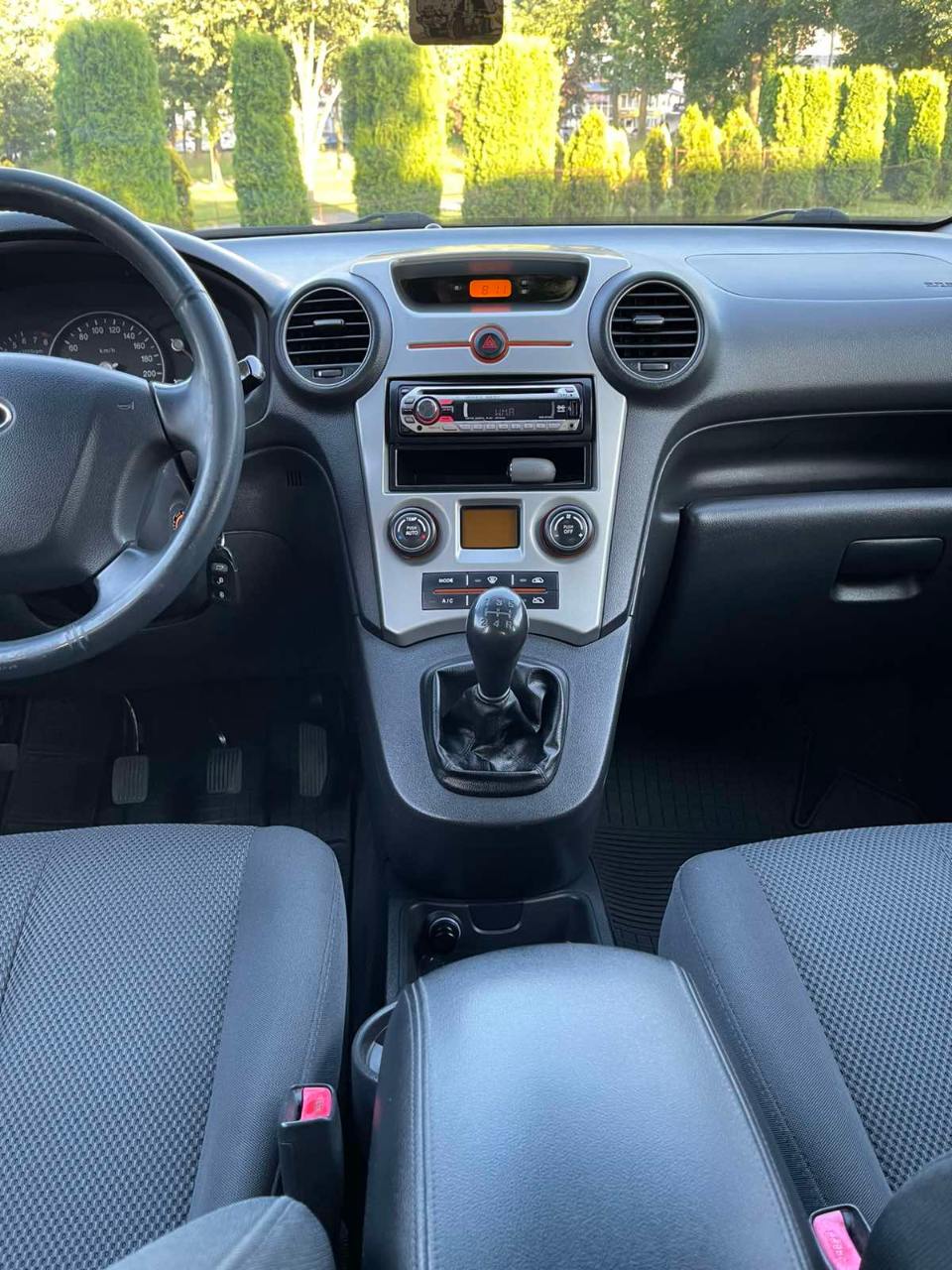 Kia Carens - фото 5