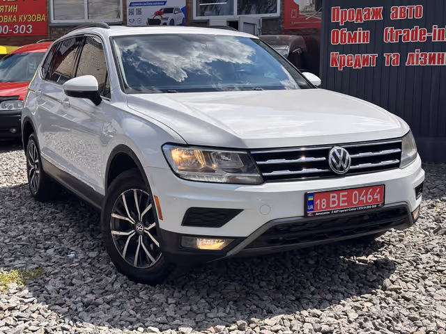 Volkswagen Tiguan - фото 1
