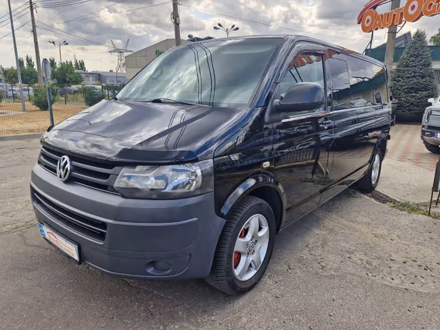 Volkswagen Caravelle - фото 1