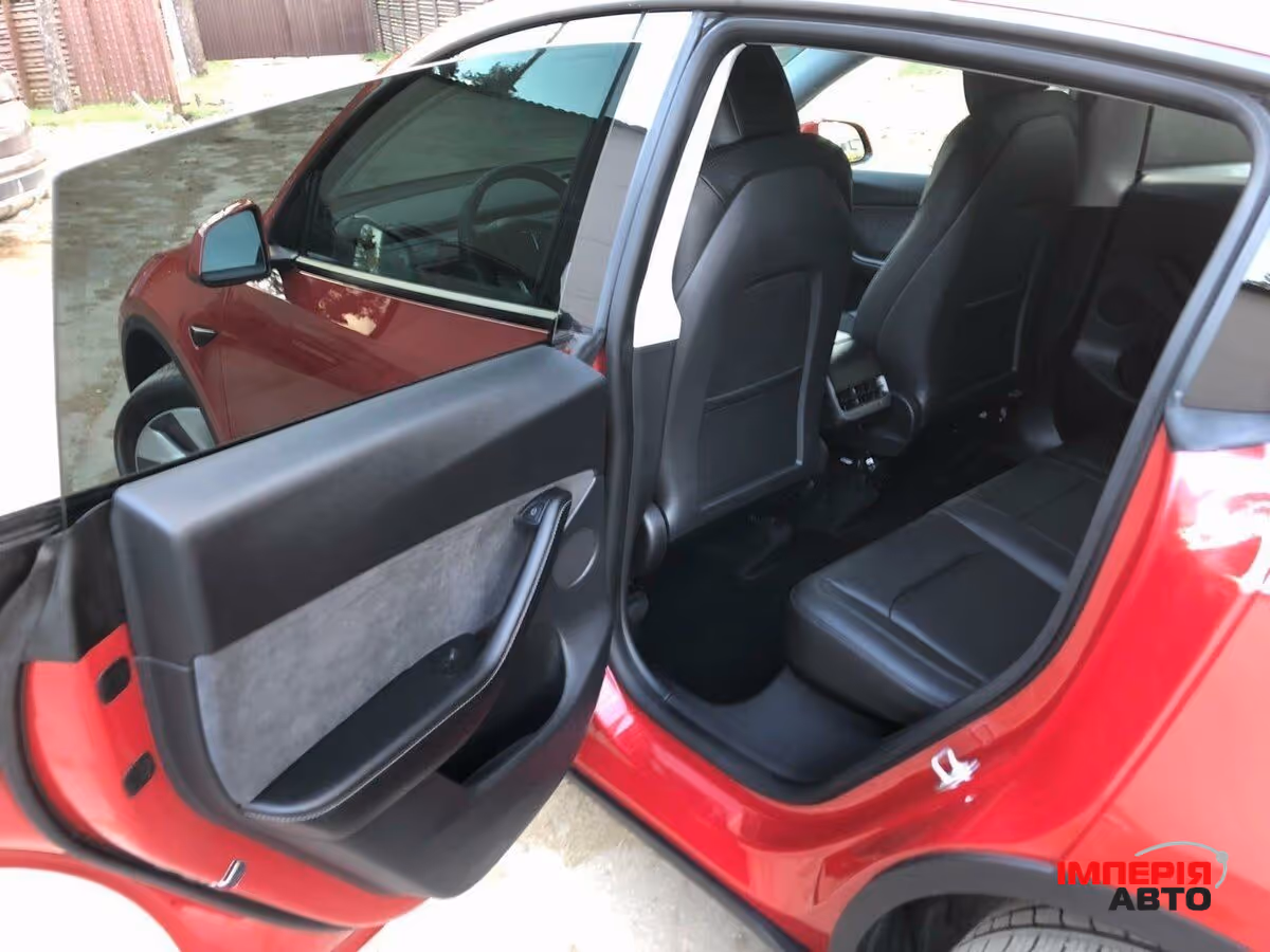 Tesla Model Y - фото 11