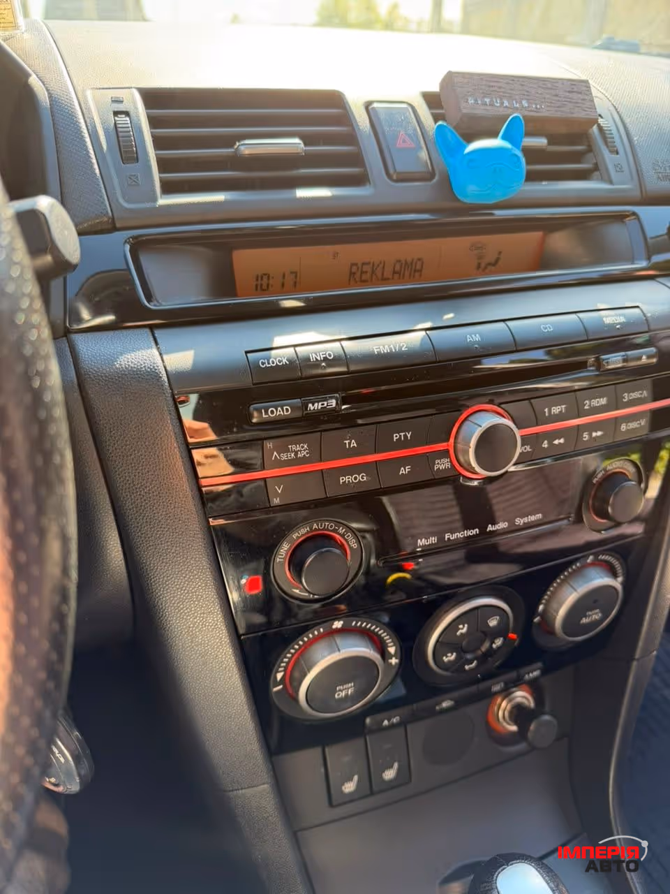 Mazda 3 - фото 7
