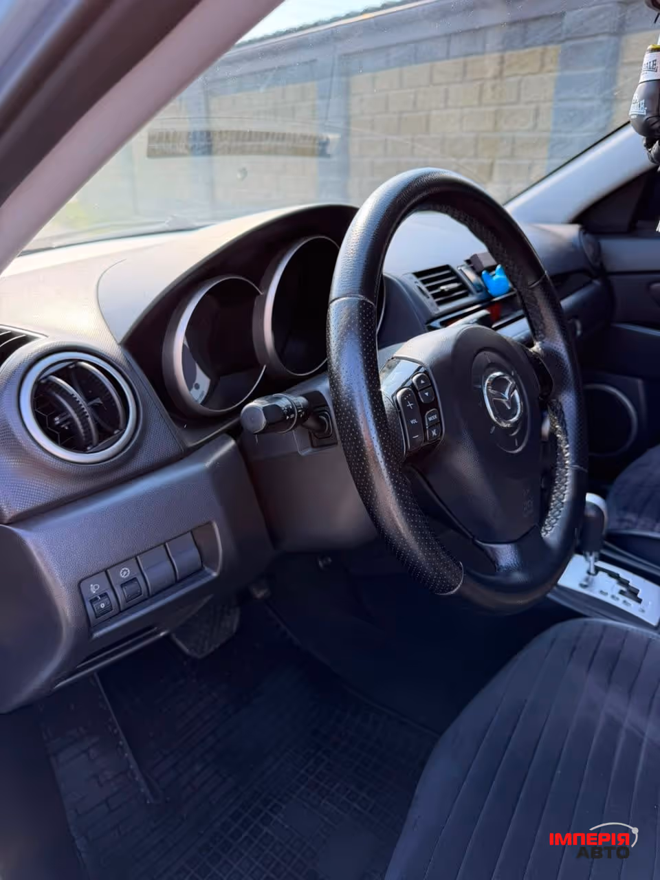 Mazda 3 - фото 11
