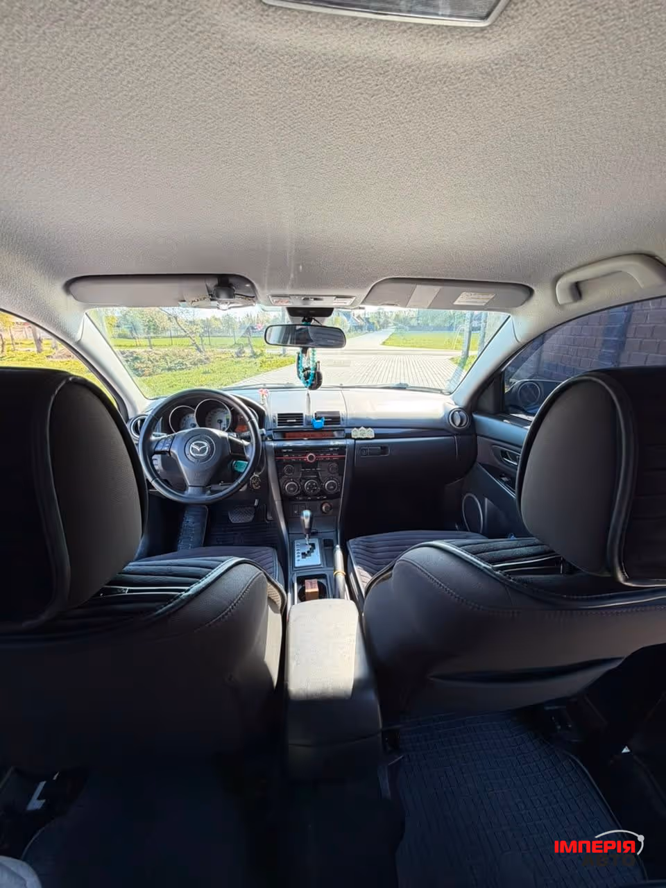 Mazda 3 - фото 10