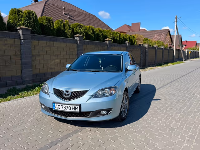 Mazda 3 - фото 2