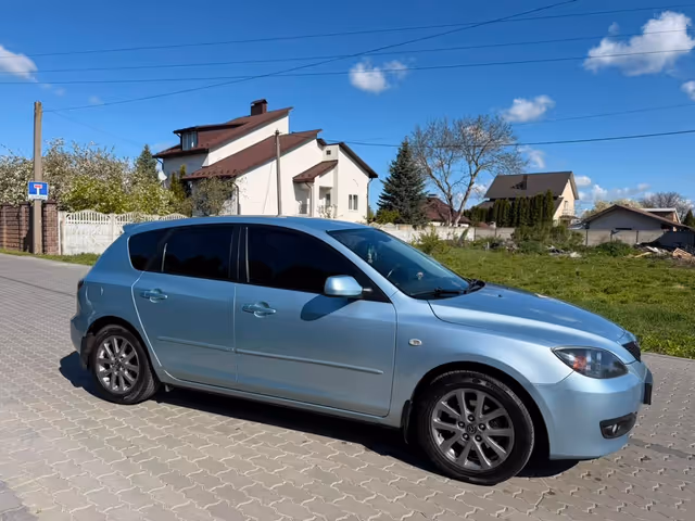 Mazda 3 - фото 4
