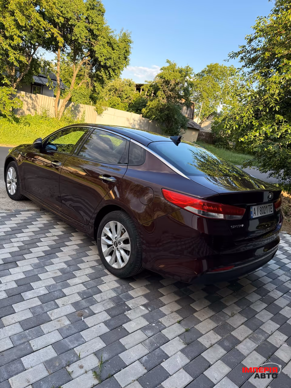 Kia Optima - фото 5
