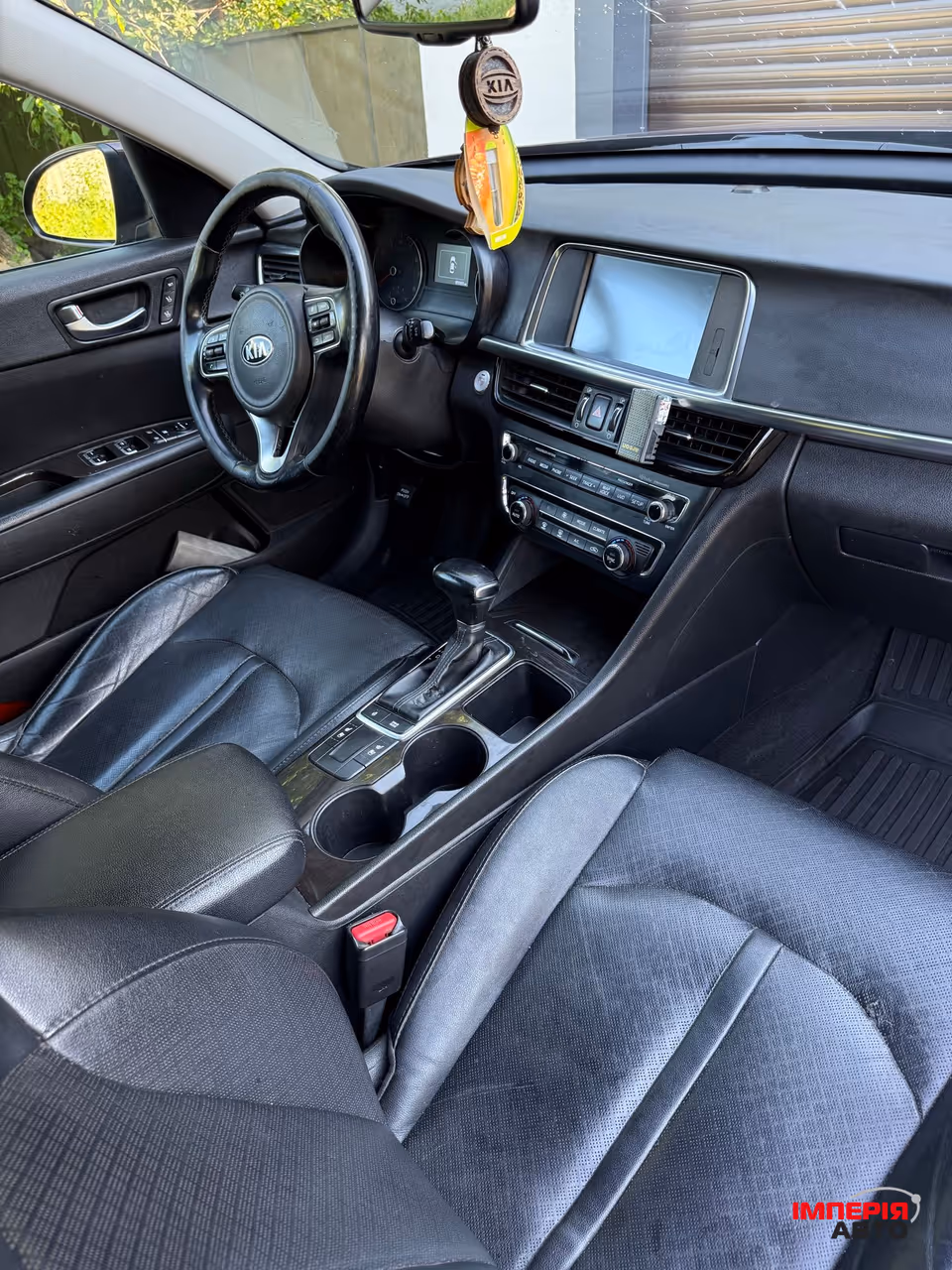 Kia Optima - фото 7