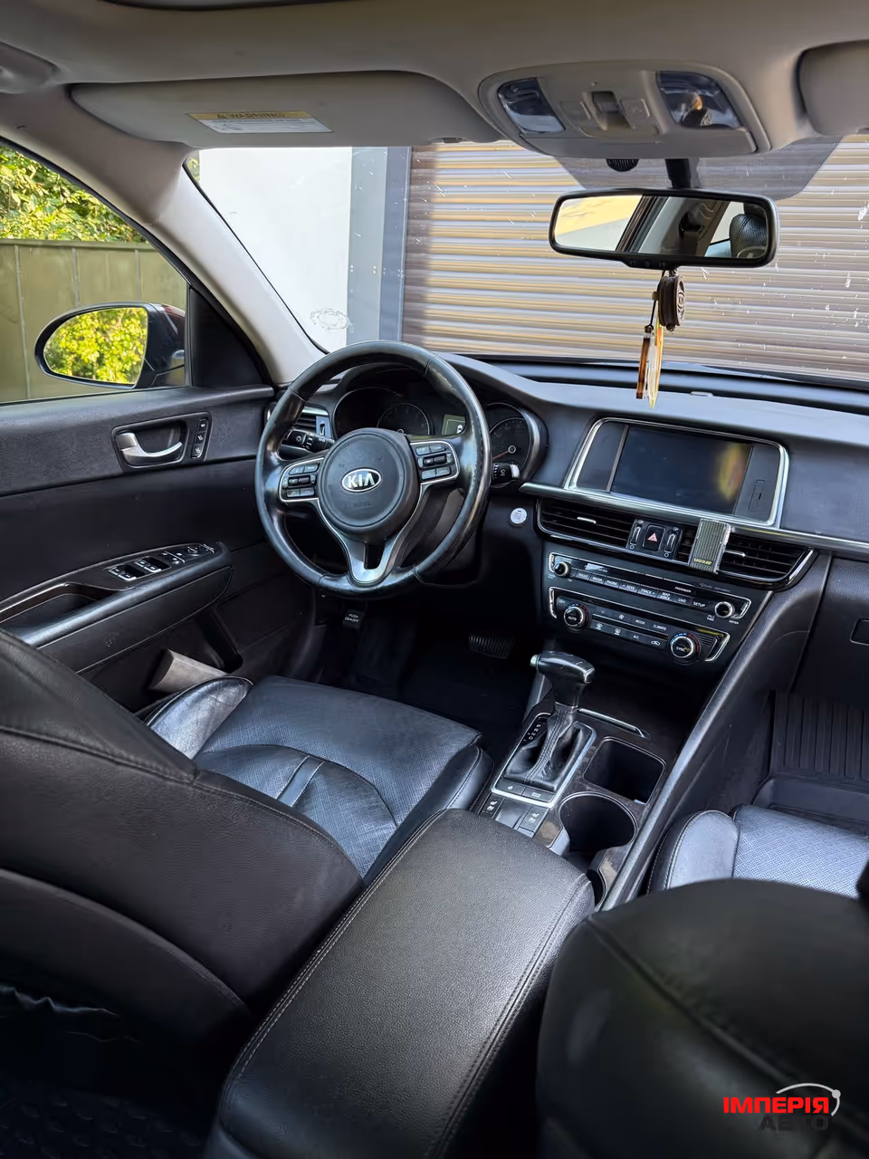Kia Optima - фото 9