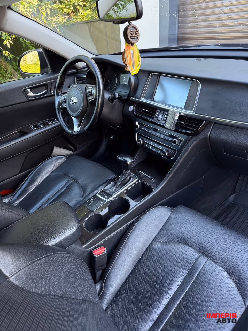 Kia Optima - фото 20