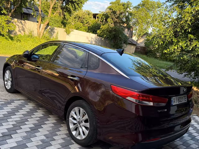 Kia Optima - фото 5