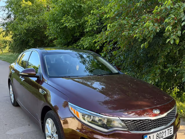 Kia Optima - фото 3
