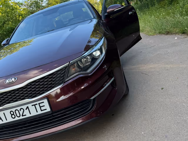 Kia Optima - фото 1