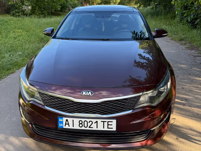 Kia Optima - фото 4