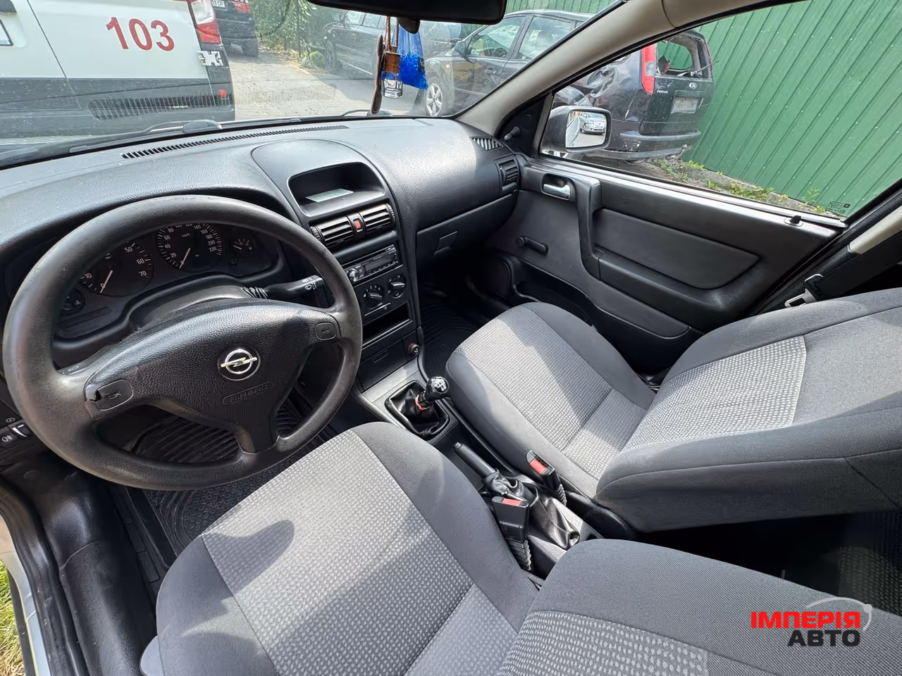 Opel Astra - фото 5