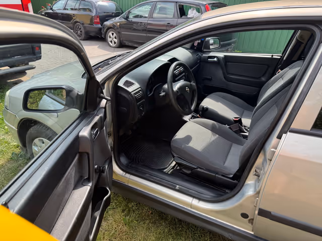 Opel Astra - фото 4