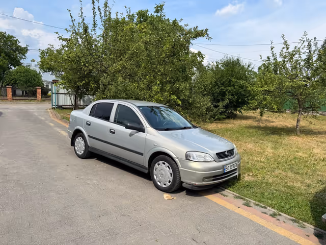 Opel Astra - фото 1