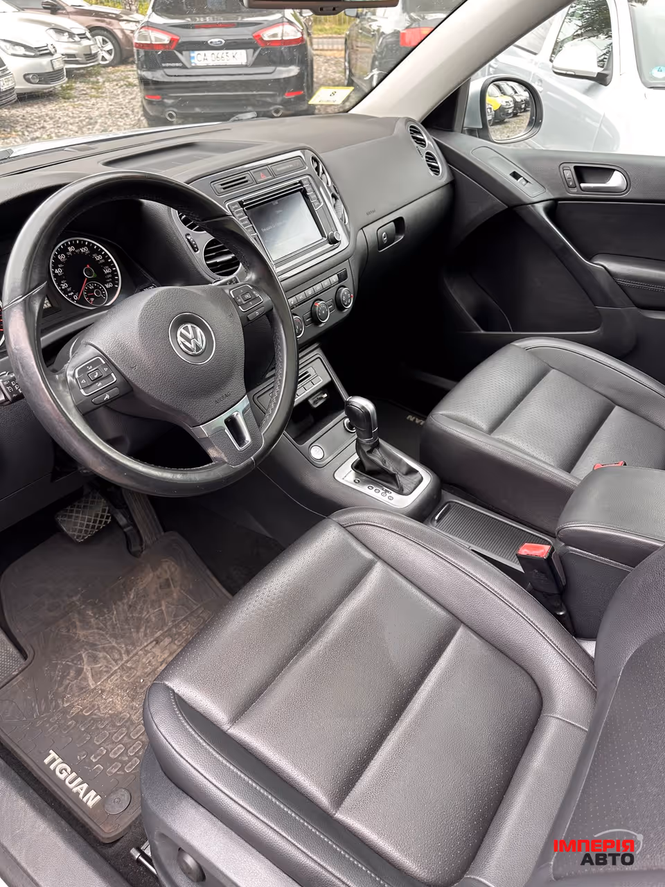 Volkswagen Tiguan - фото 9