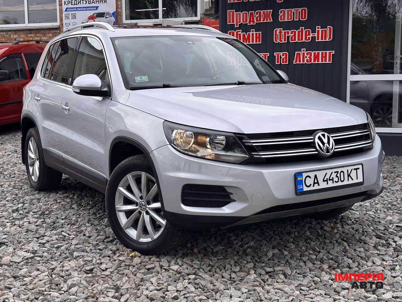Volkswagen Tiguan - фото 1