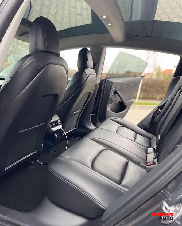 Tesla Model 3 - фото 16