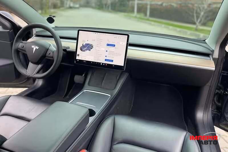 Tesla Model 3 - фото 10