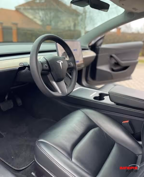 Tesla Model 3 - фото 12