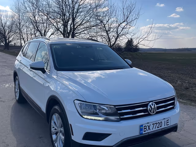Volkswagen Tiguan - фото 1