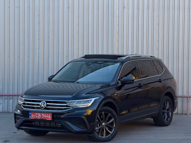 Volkswagen Tiguan - фото 1