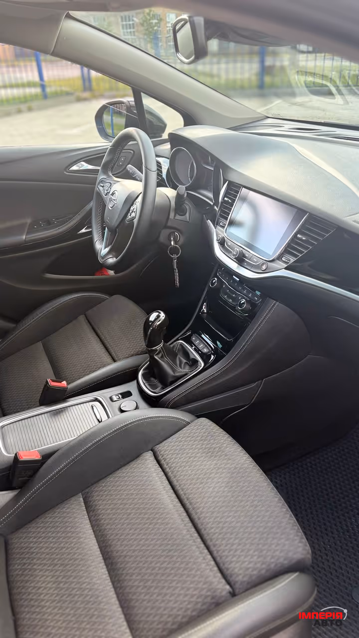 Opel Astra - фото 7