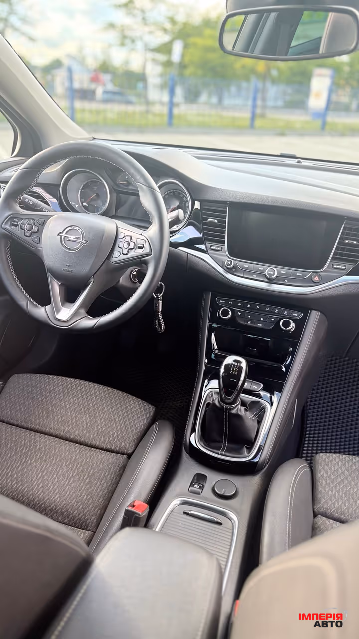 Opel Astra - фото 5
