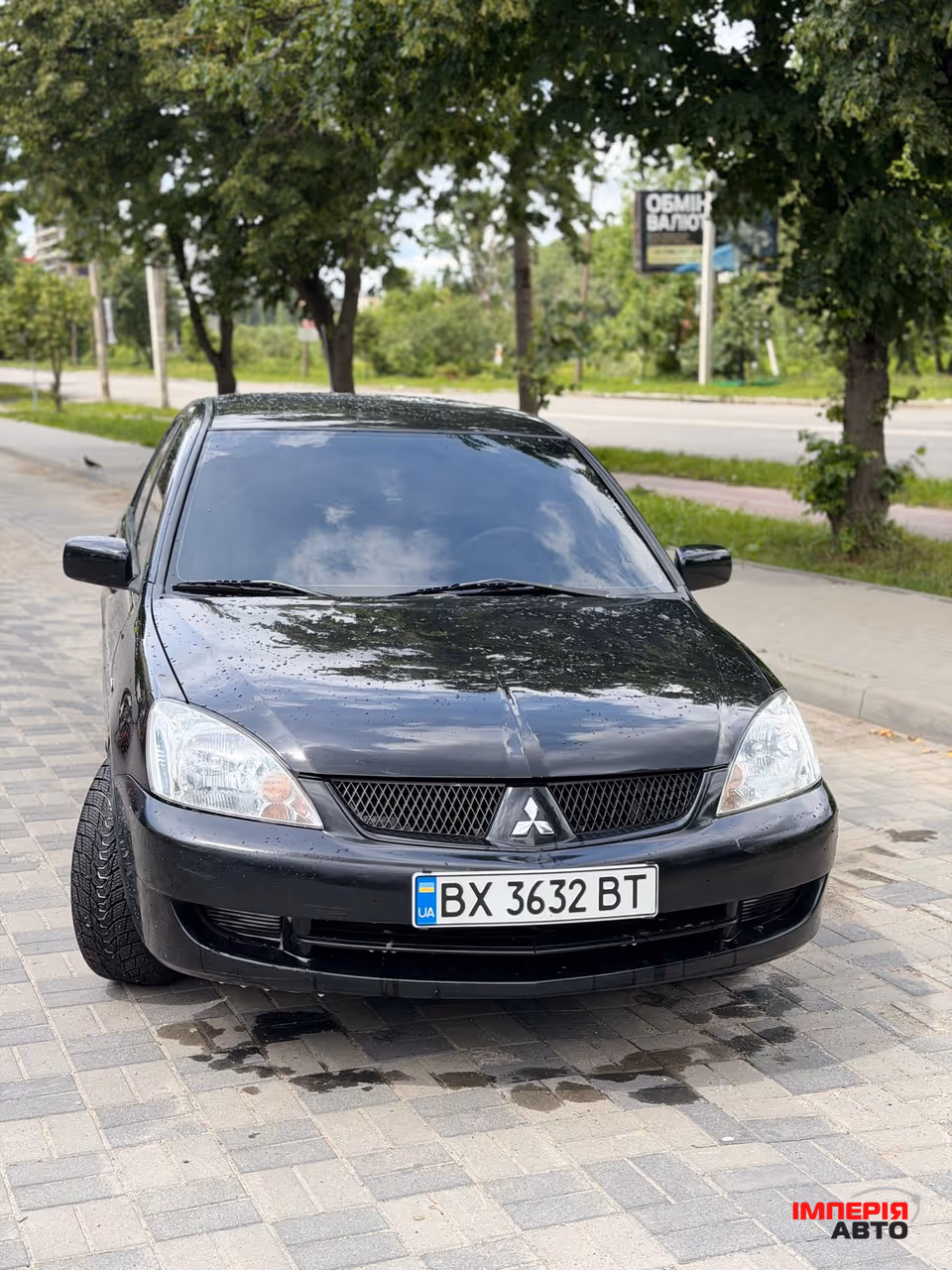 Mitsubishi Lancer - фото 1